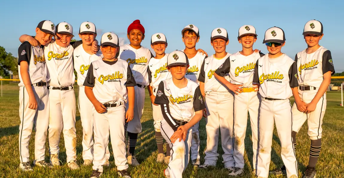 A Gorilla Baseball Club team together on the field after a game