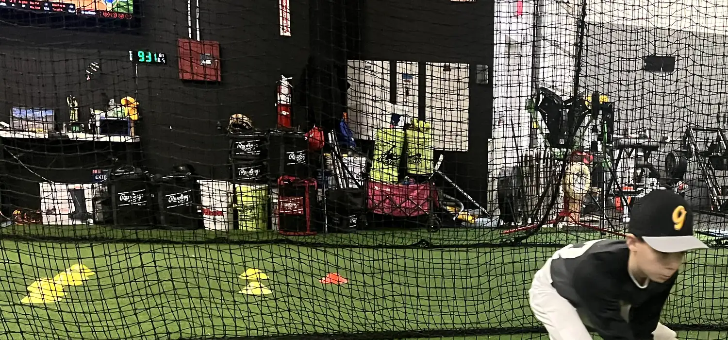 The HitTrax cage and display inside the Gorilla Baseball Academy facility