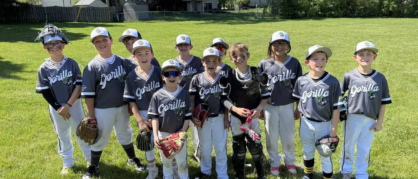 A Gorilla Baseball Club team together on the field after a game